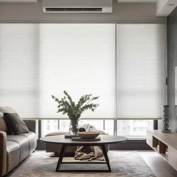 Cream-colored smart blinds with remote control in Abu Dhabi home